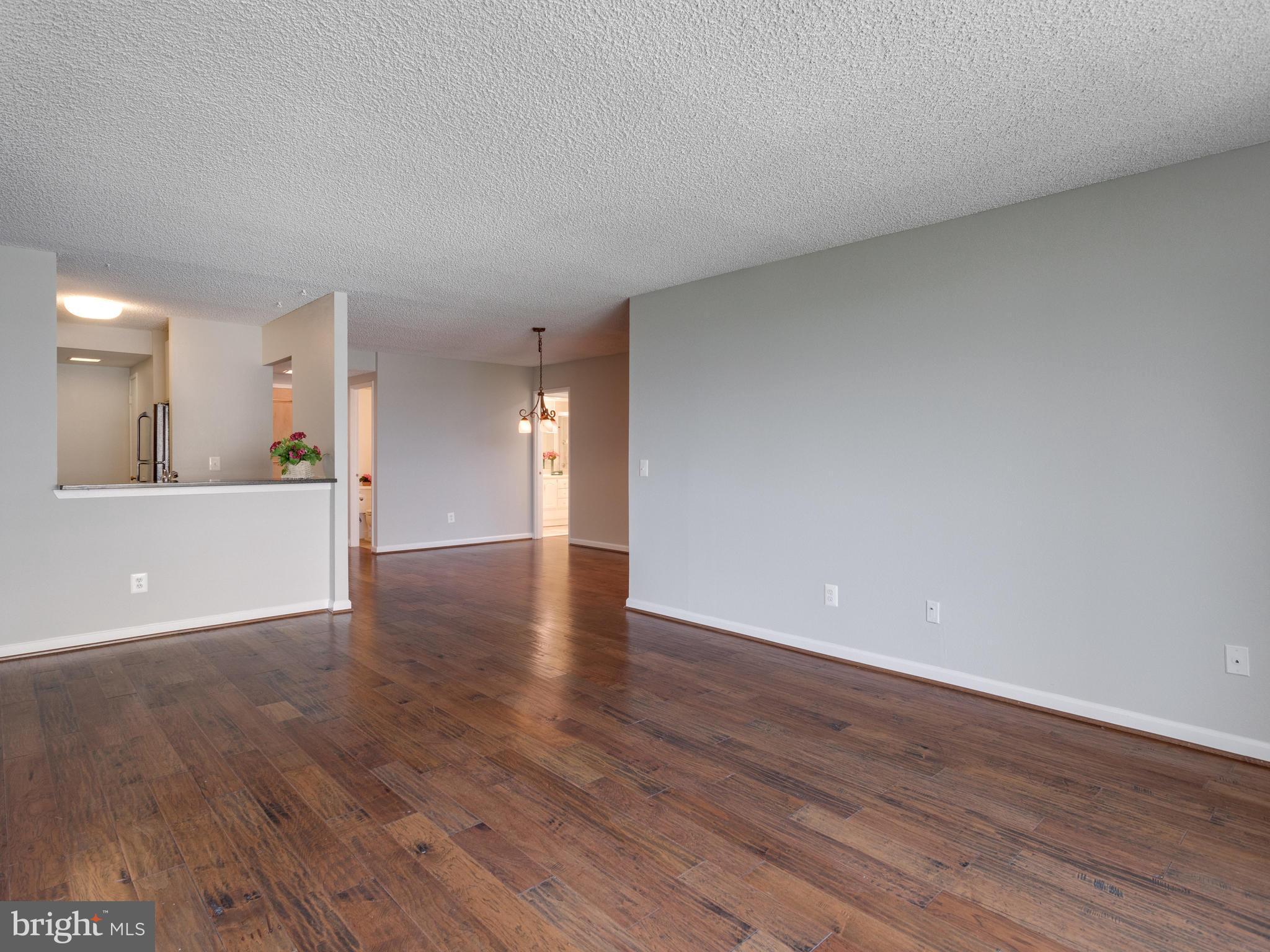 6101 Edsall Road, Unit 809 Alexandria, VA 22304 - Photo 4 of 27 LIVING ROOM / KITCHEN / DINING AREA