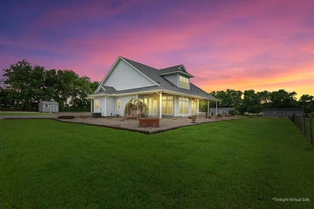 a view of a house with a big yard