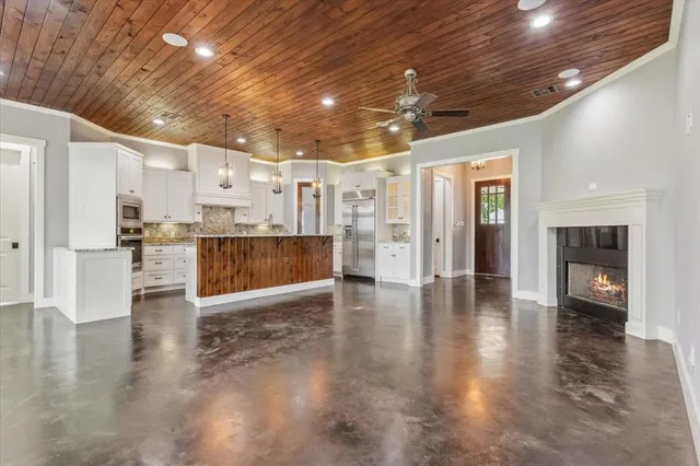 a view of a livingroom with wooden floor