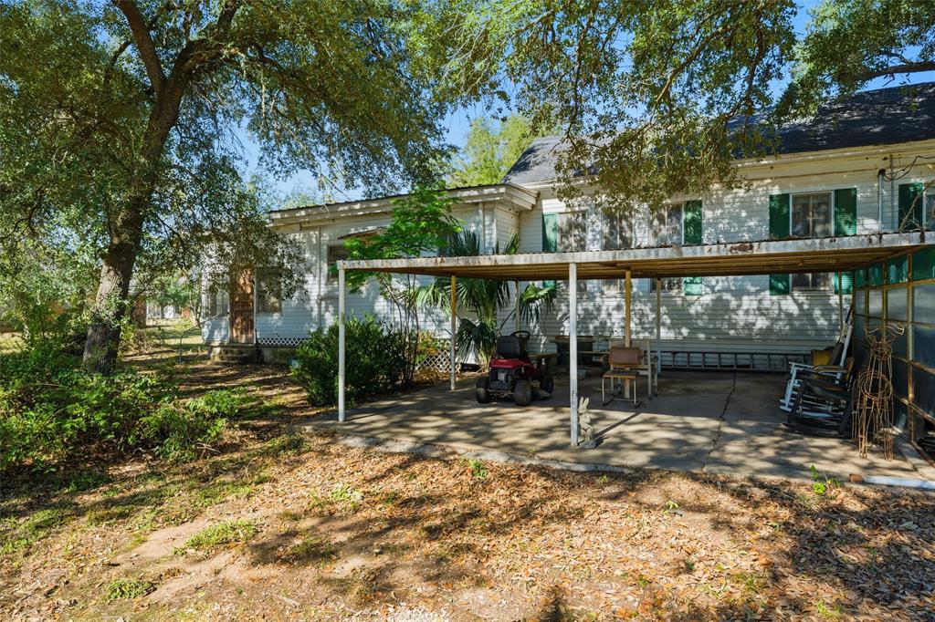 409 China Street Calvert, TX 77837 - Photo 15 of 18 a view of a bench in the backyard
