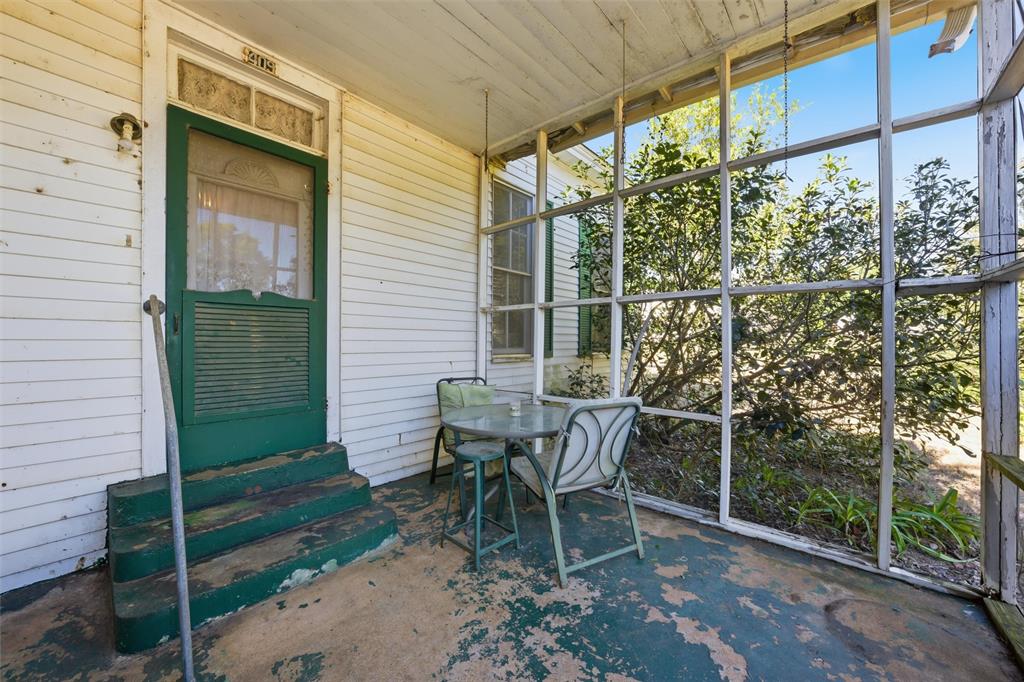 409 China Street Calvert, TX 77837 - Photo 2 of 18 a view of a chair and table in backyard of the house