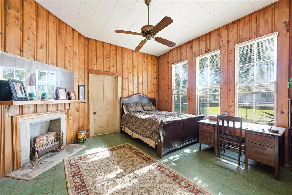 409 China Street Calvert, TX 77837 - Photo 5 of 18 a living room with furniture and a fireplace
