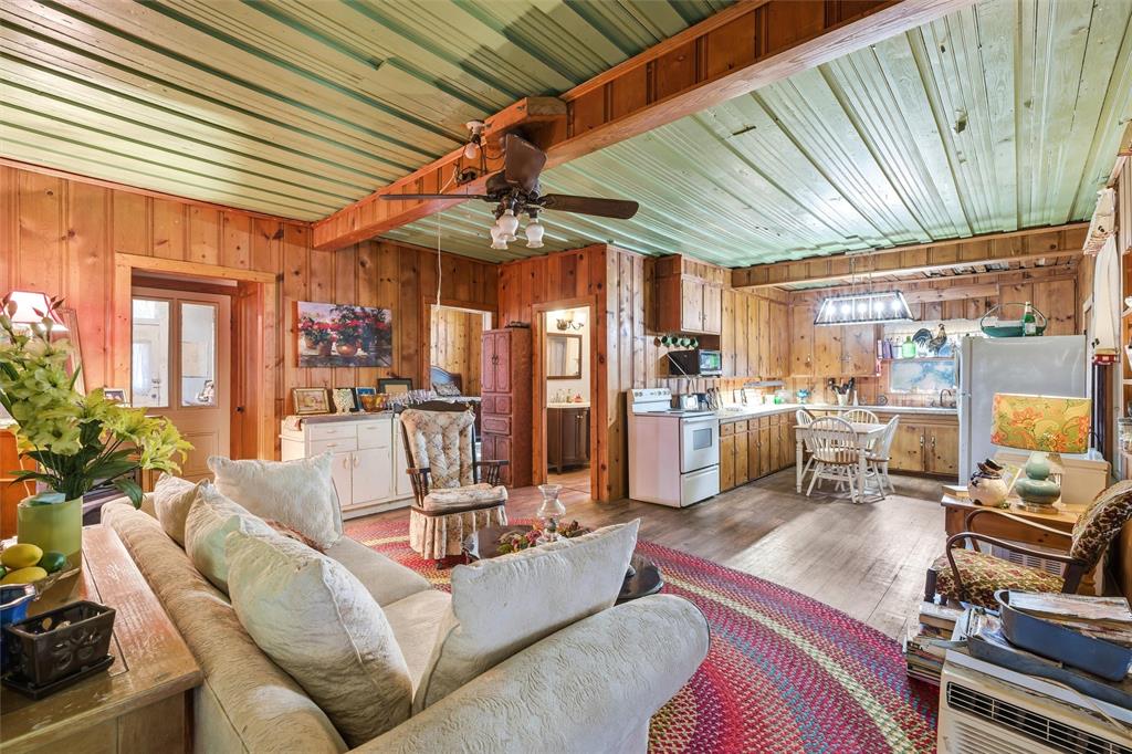 409 China Street Calvert, TX 77837 - Photo 7 of 18 a living room with furniture and a flat screen tv