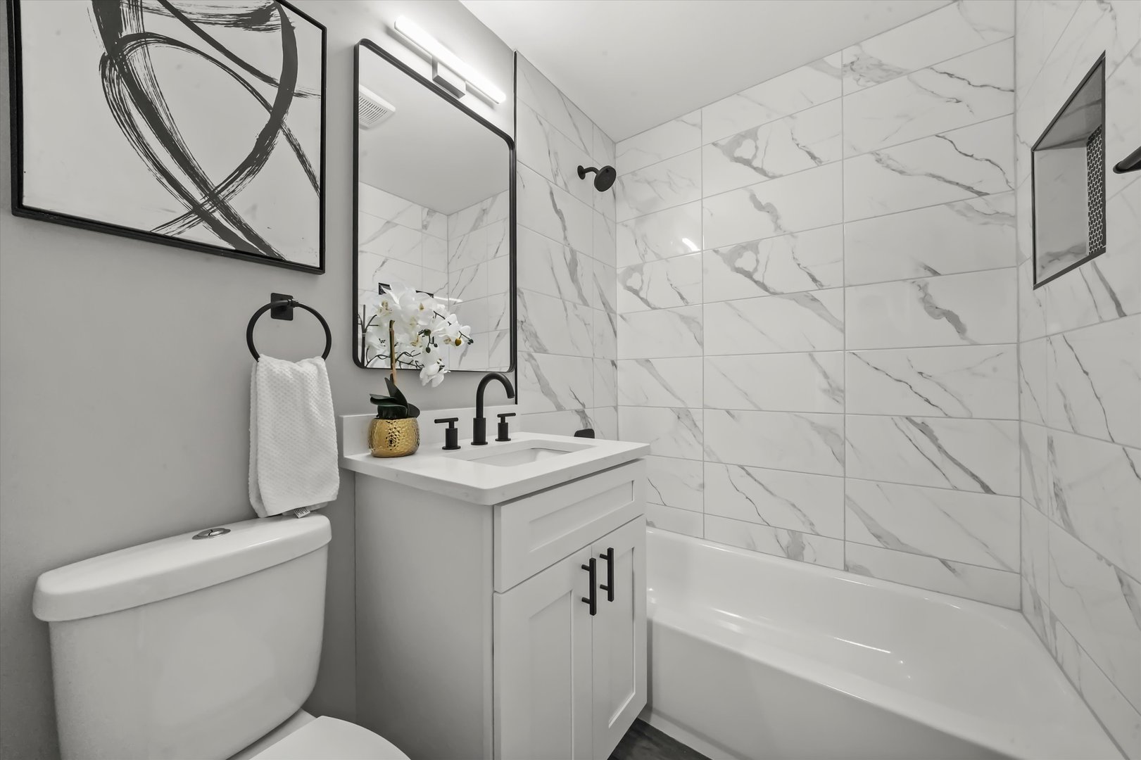 2243 Spruce Road Homewood, IL 60430 - Photo 12 of 22 a bathroom with a sink a toilet and a bathtub