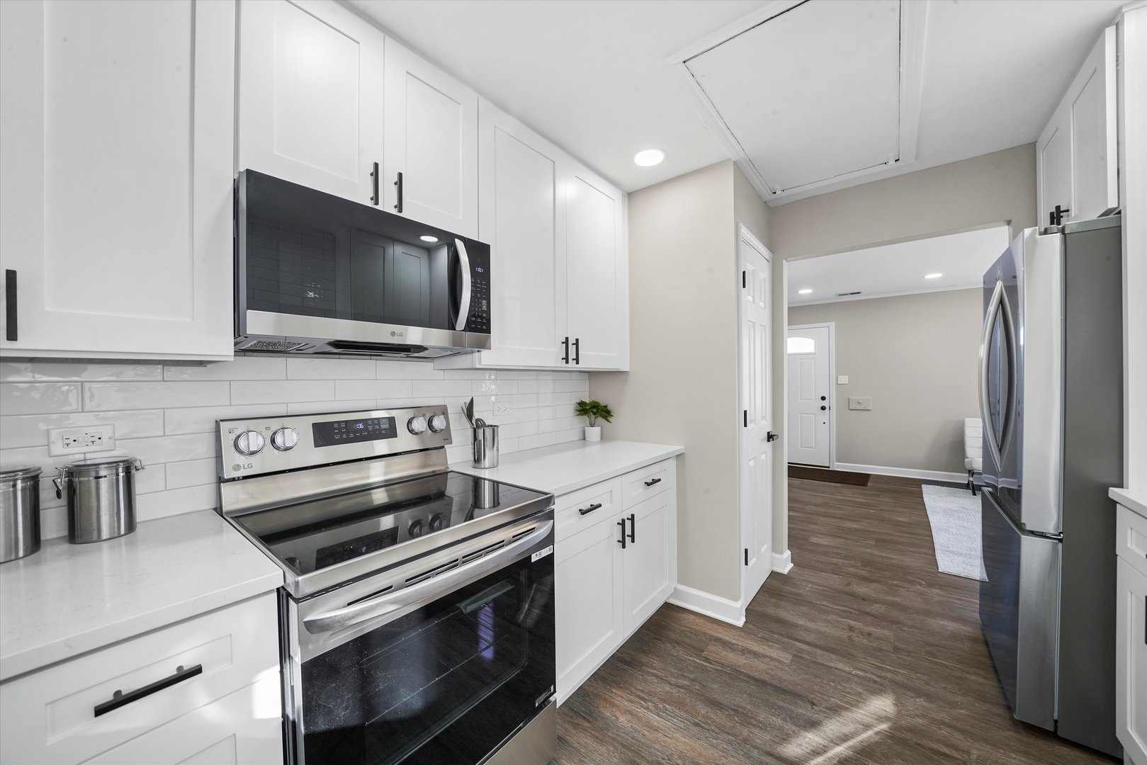 2243 Spruce Road Homewood, IL 60430 - Photo 8 of 22 a kitchen with a stove and a microwave