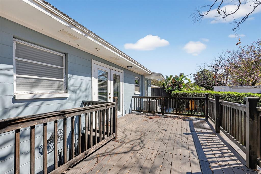 2714 West Grace Street Tampa, FL 33607 - Photo 23 of 26 a view of a balcony with wooden floor