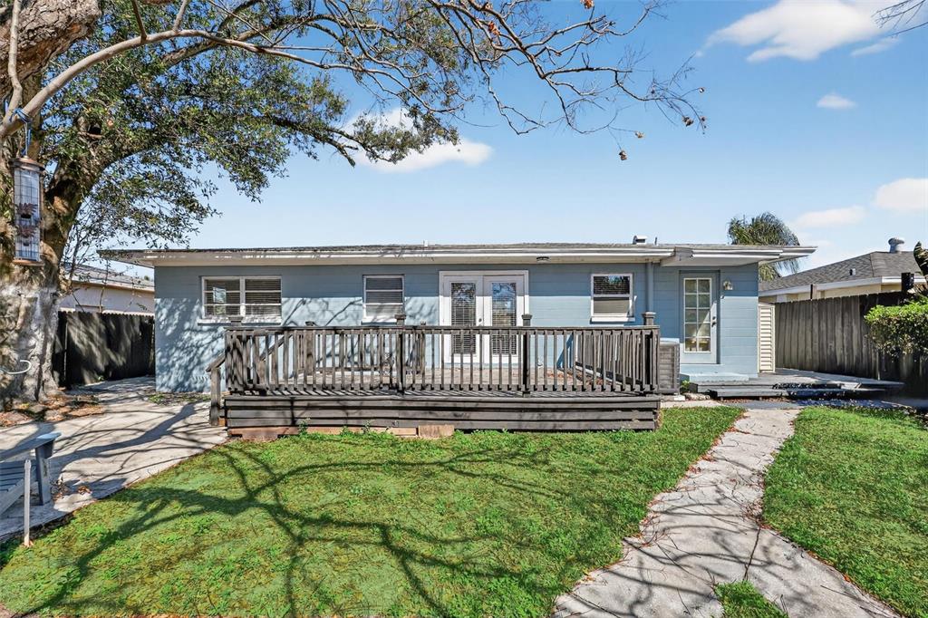 2714 West Grace Street Tampa, FL 33607 - Photo 25 of 26 a house view with a garden space
