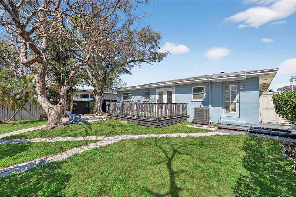 2714 West Grace Street Tampa, FL 33607 - Photo 26 of 26 a view of a house with a yard and sitting area
