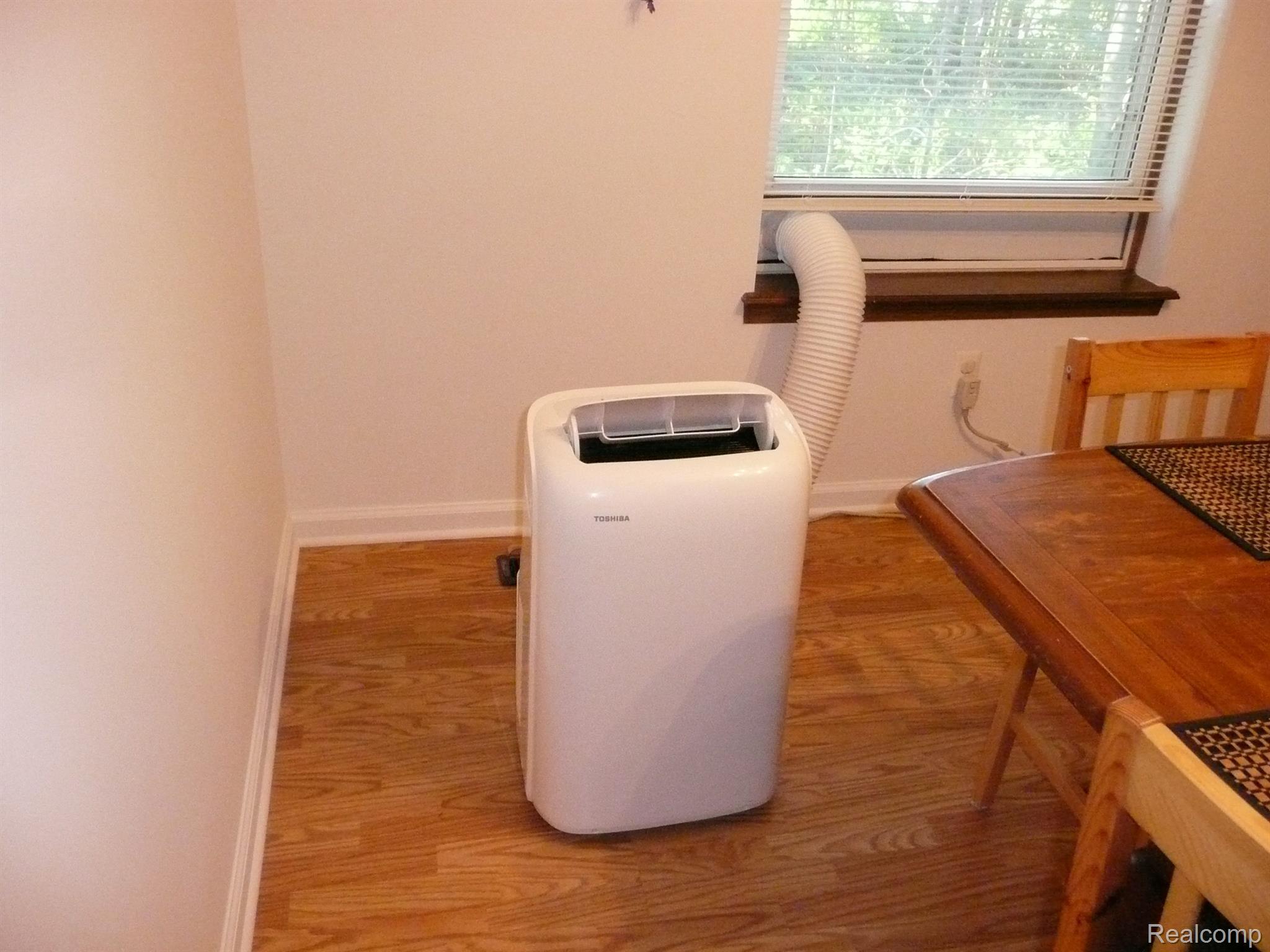 6016 Crandall Road Howell, MI 48855 - Photo 22 of 29 Floor portable A/C