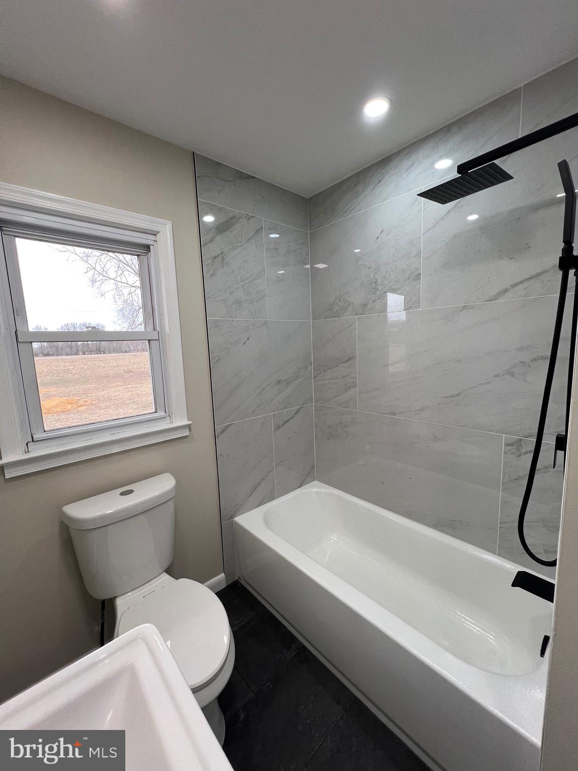 1086 Elk Road Monroeville, NJ 08343 - Photo 15 of 23 a bathroom with a toilet and a shower