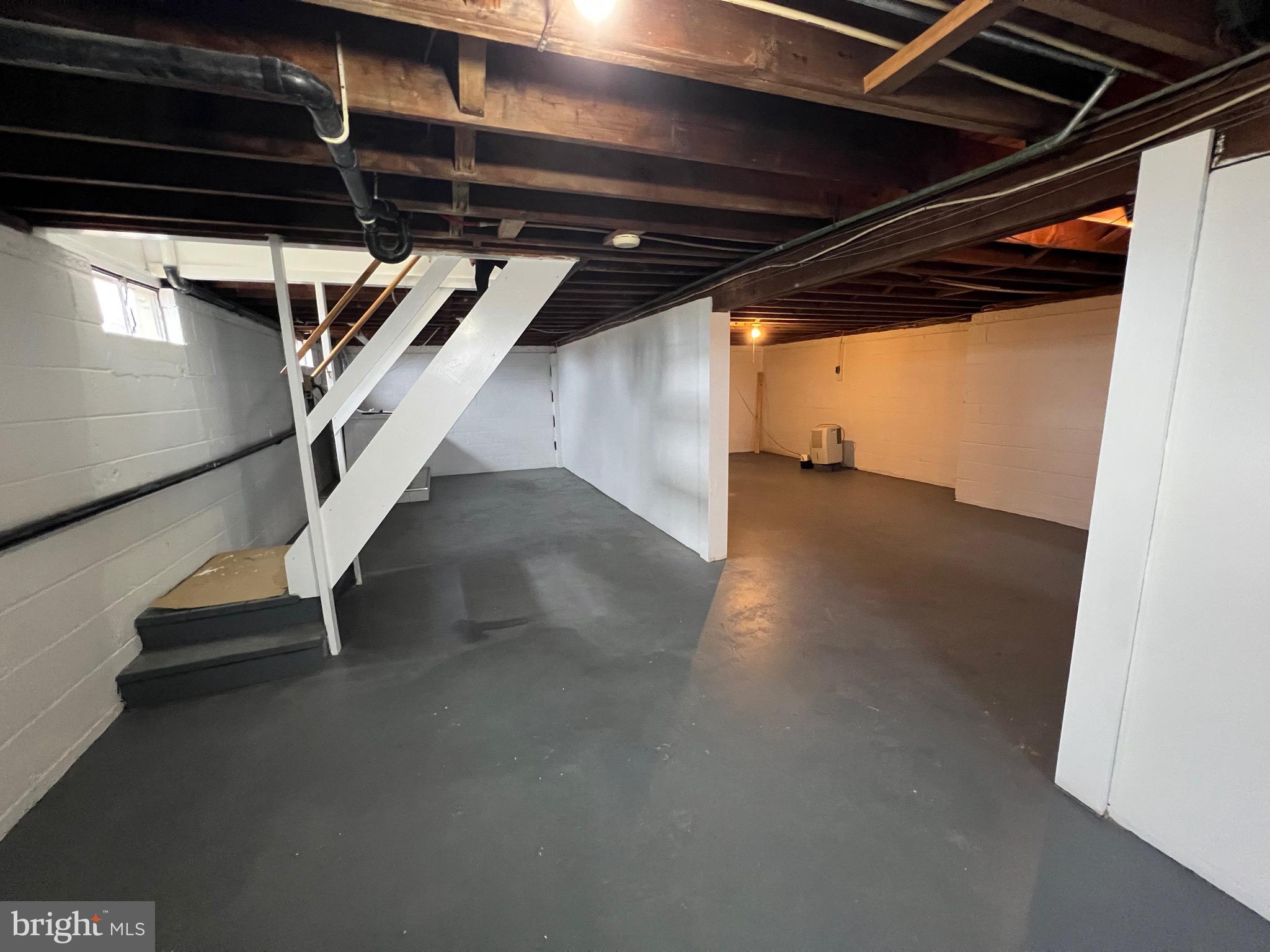 1086 Elk Road Monroeville, NJ 08343 - Photo 19 of 23 a view of an empty room with stairs