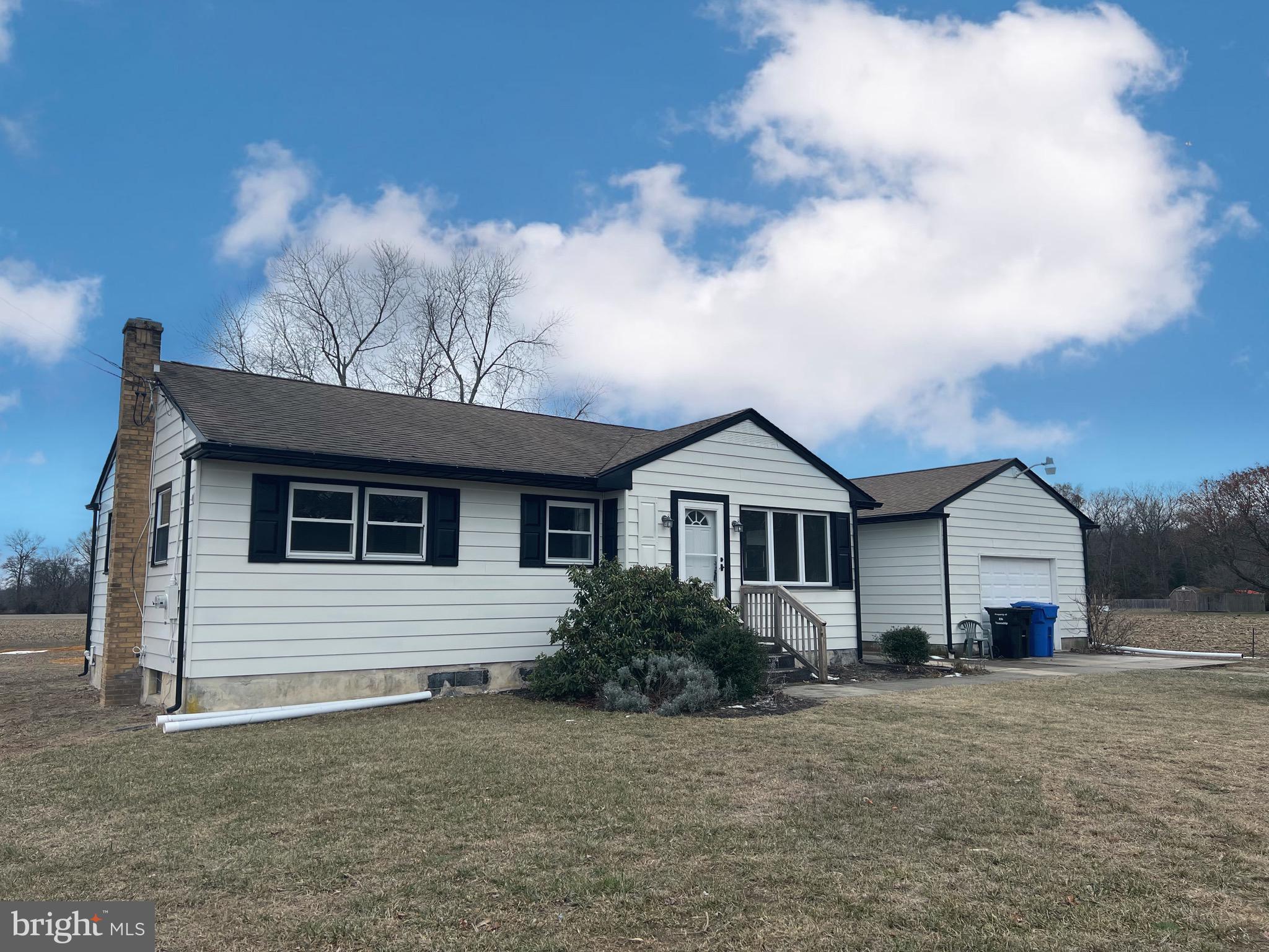 1086 Elk Road Monroeville, NJ 08343 - Photo 2 of 23 a view of a house with a backyard