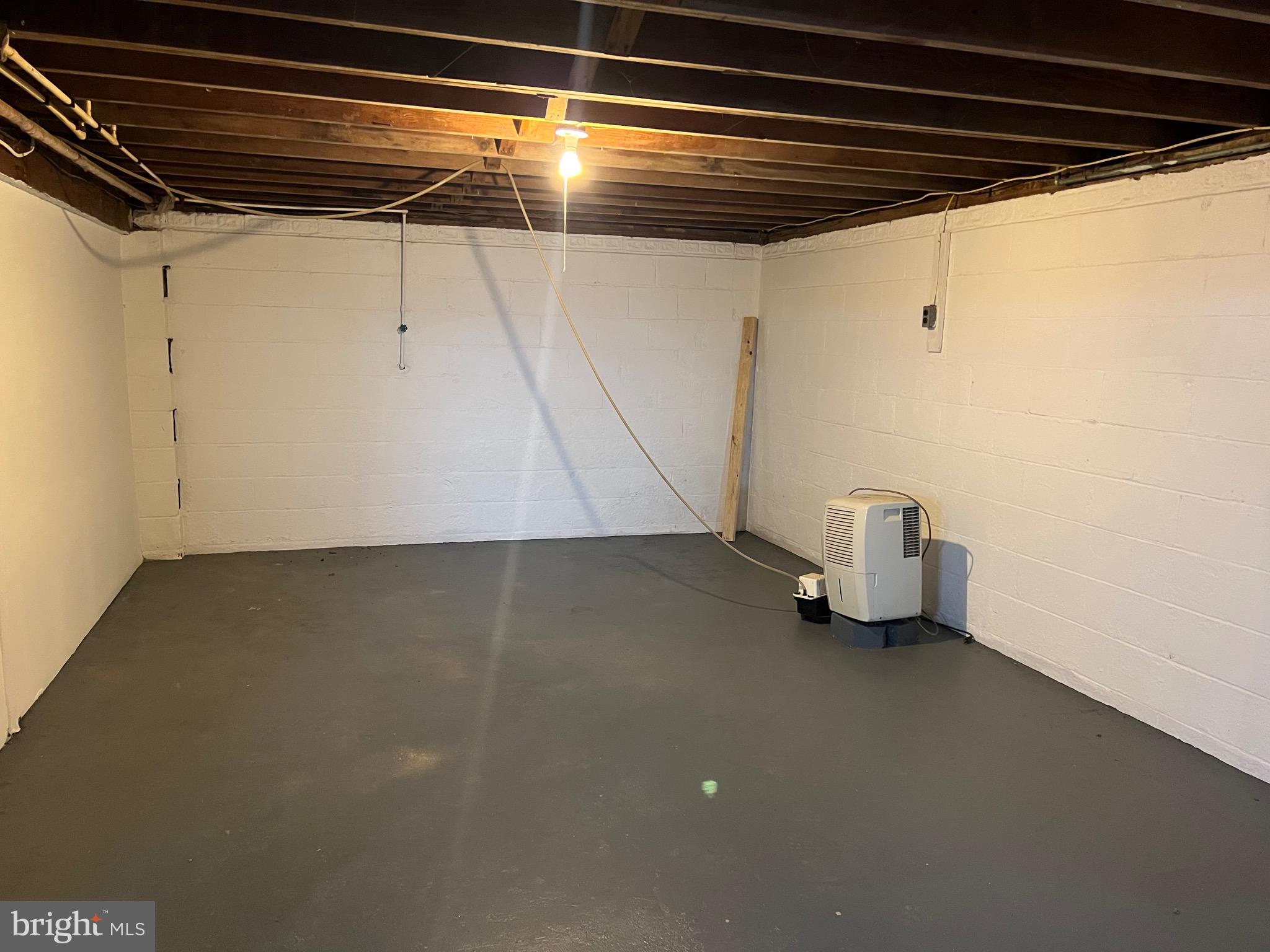 1086 Elk Road Monroeville, NJ 08343 - Photo 21 of 23 a view of a room with racks on the wall