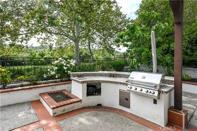 a view of a patio with a fireplace