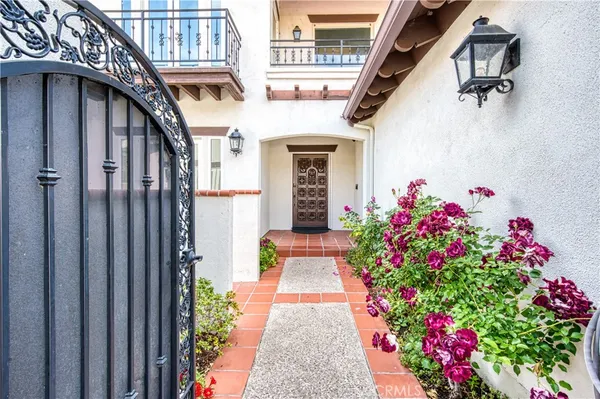a view of entryway with flower pots