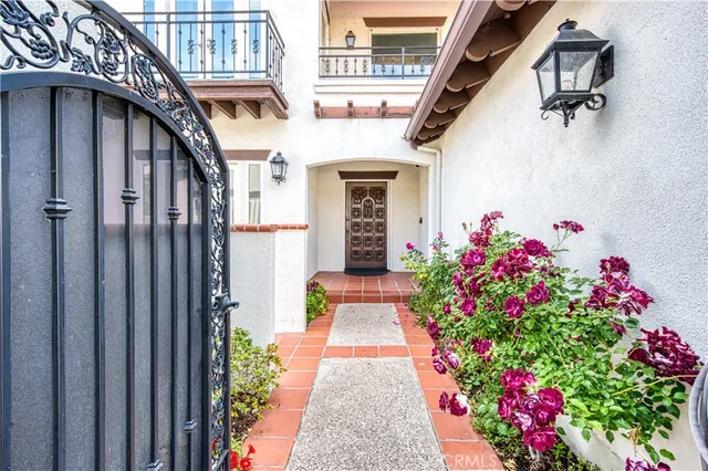 a view of entryway with flower pots
