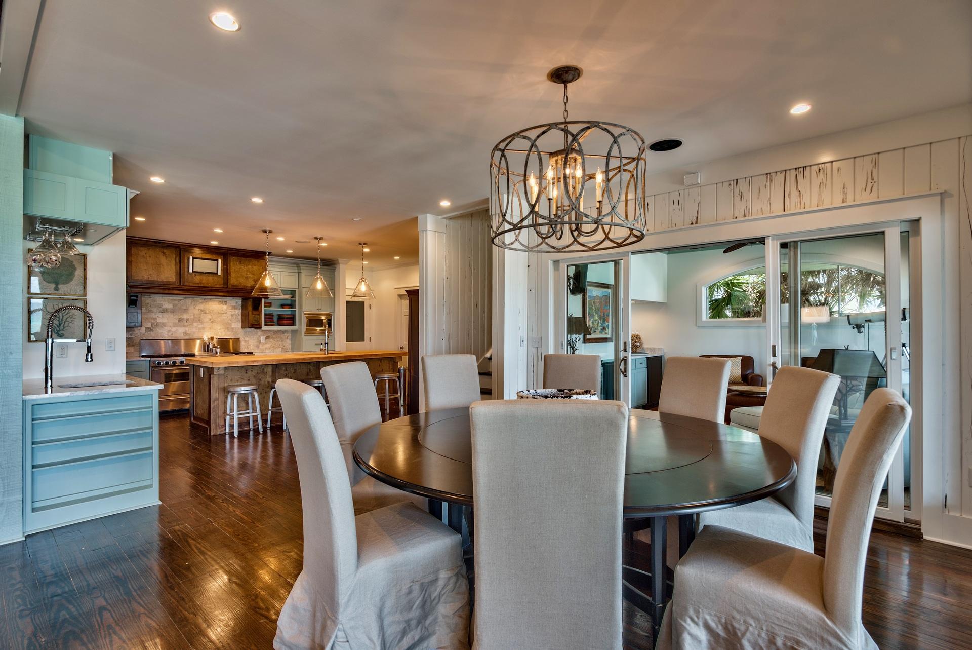 59 Auburn Drive Santa Rosa Beach, FL 32459 - Photo 20 of 71 a view of a dining room with furniture a chandelier and wooden floor