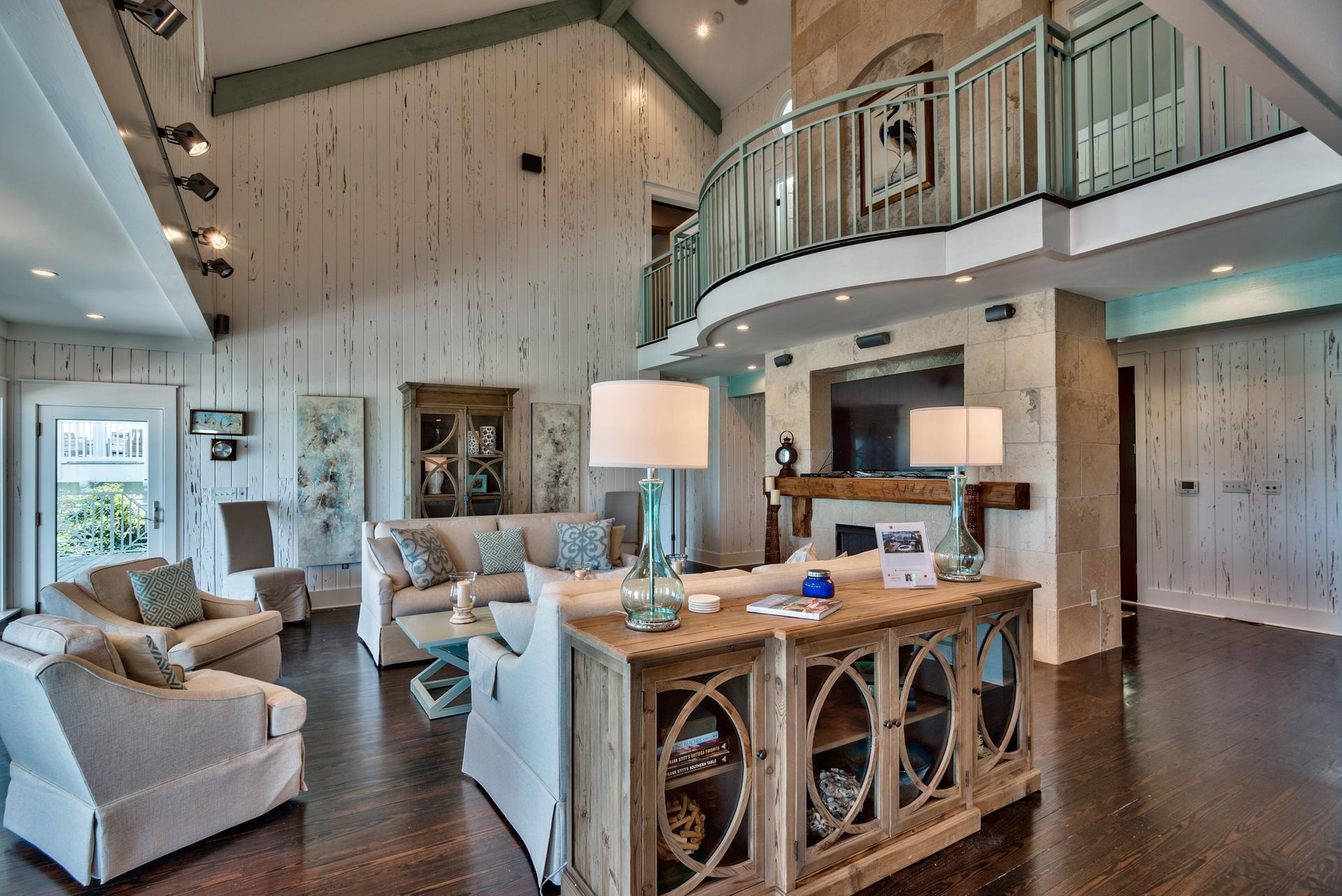 59 Auburn Drive Santa Rosa Beach, FL 32459 - Photo 21 of 71 a living room with stainless steel appliances kitchen island granite countertop a couch a dining table and chairs with wooden floor