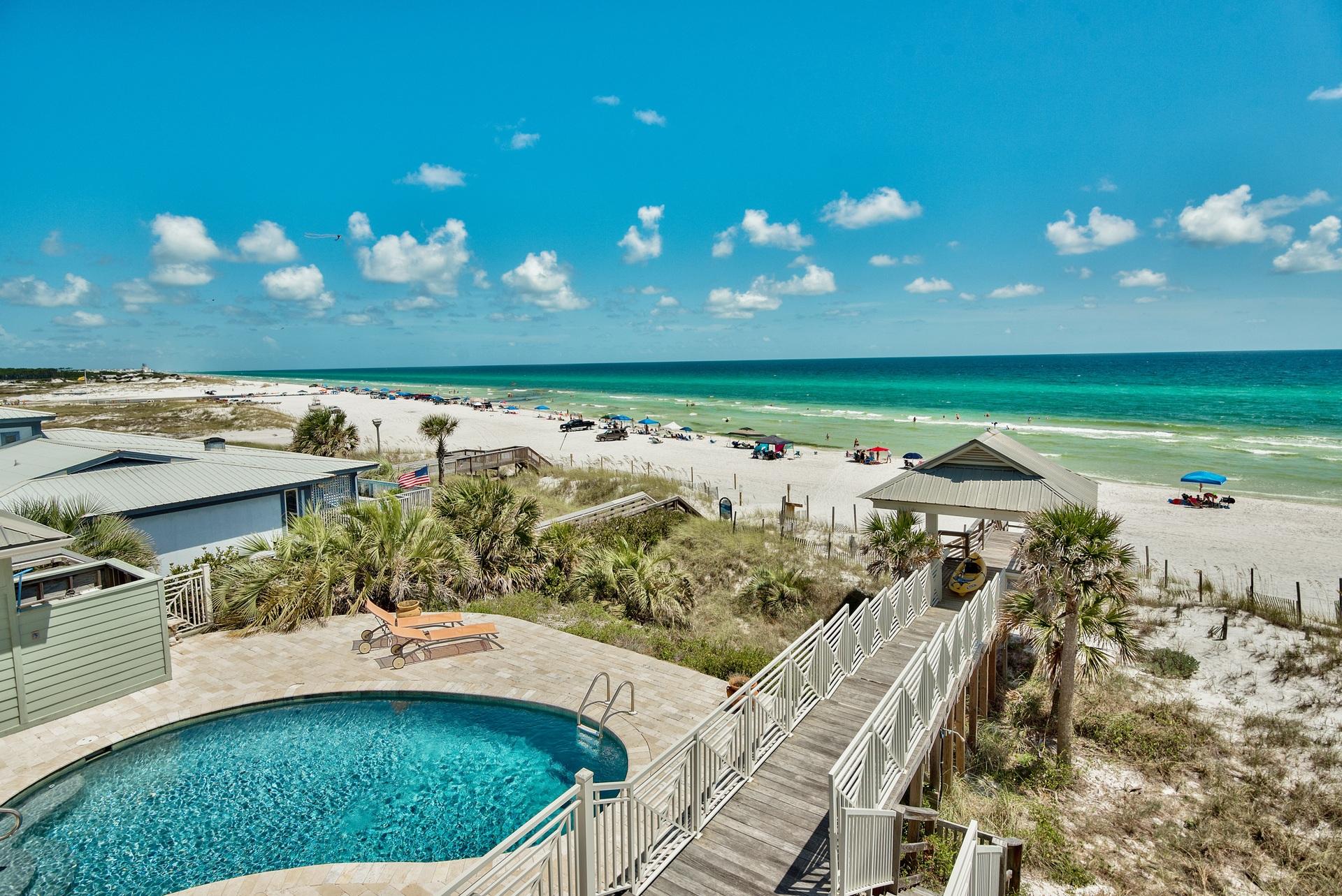 59 Auburn Drive Santa Rosa Beach, FL 32459 - Photo 49 of 71 a view of a swimming pool with an outdoor space and seating area
