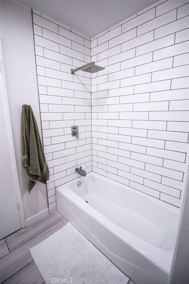 808 Gian Drive Torrance, CA 90502 - Photo 18 of 36 a bathroom with a bathtub and a shower