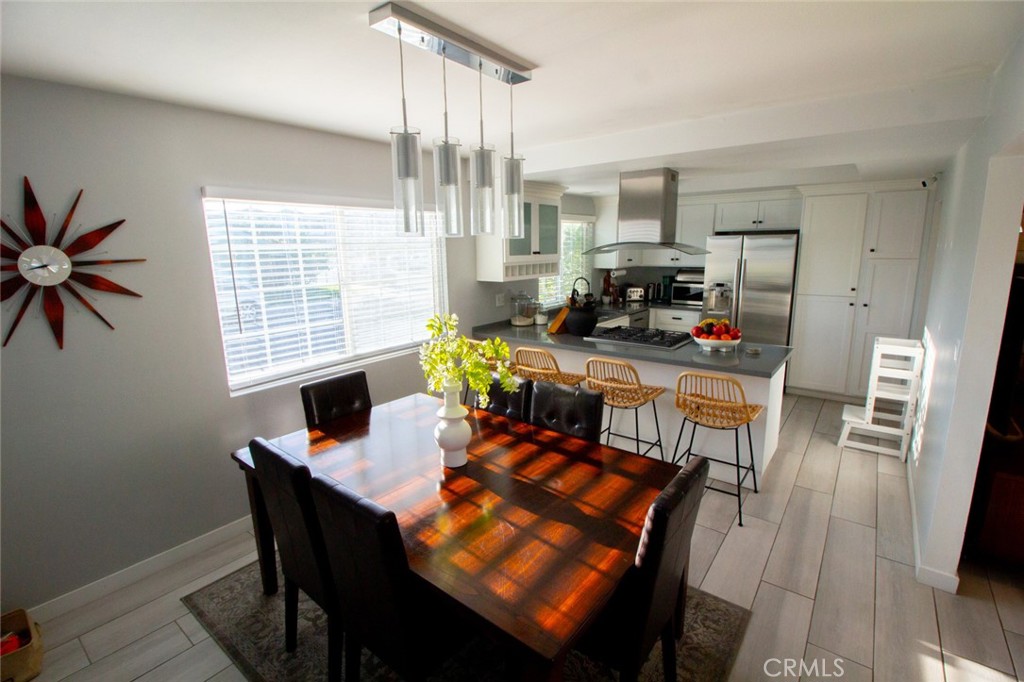 808 Gian Drive Torrance, CA 90502 - Photo 21 of 36 a view of a dining room with furniture window and wooden floor