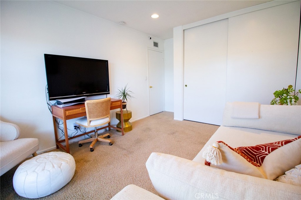 808 Gian Drive Torrance, CA 90502 - Photo 28 of 36 a living room with furniture and a flat screen tv