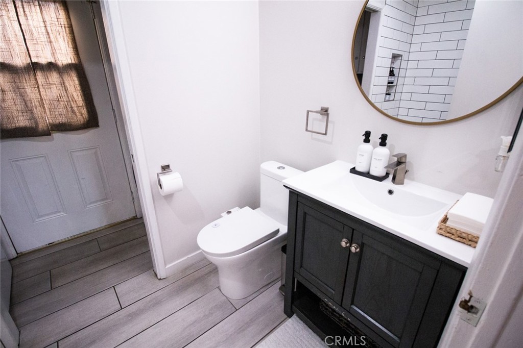 808 Gian Drive Torrance, CA 90502 - Photo 30 of 36 a bathroom with a sink and a mirror