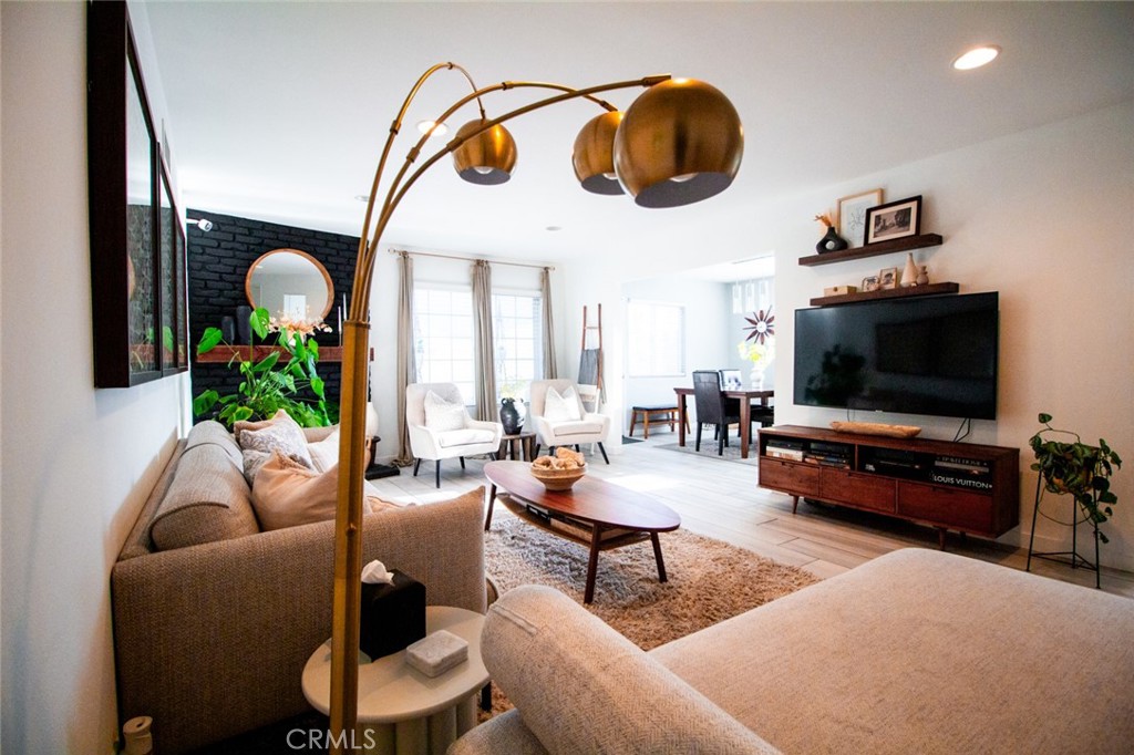 808 Gian Drive Torrance, CA 90502 - Photo 5 of 36 a living room with furniture and a flat screen tv