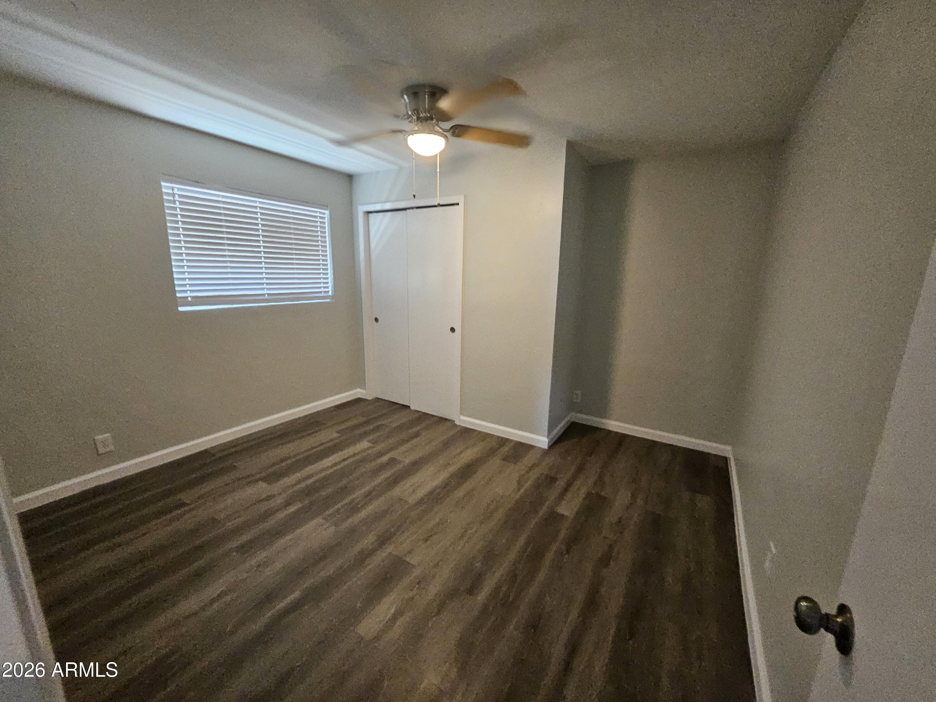 524 West 3rd Place Mesa, AZ 85201 - Photo 13 of 23 wooden floor in an empty room