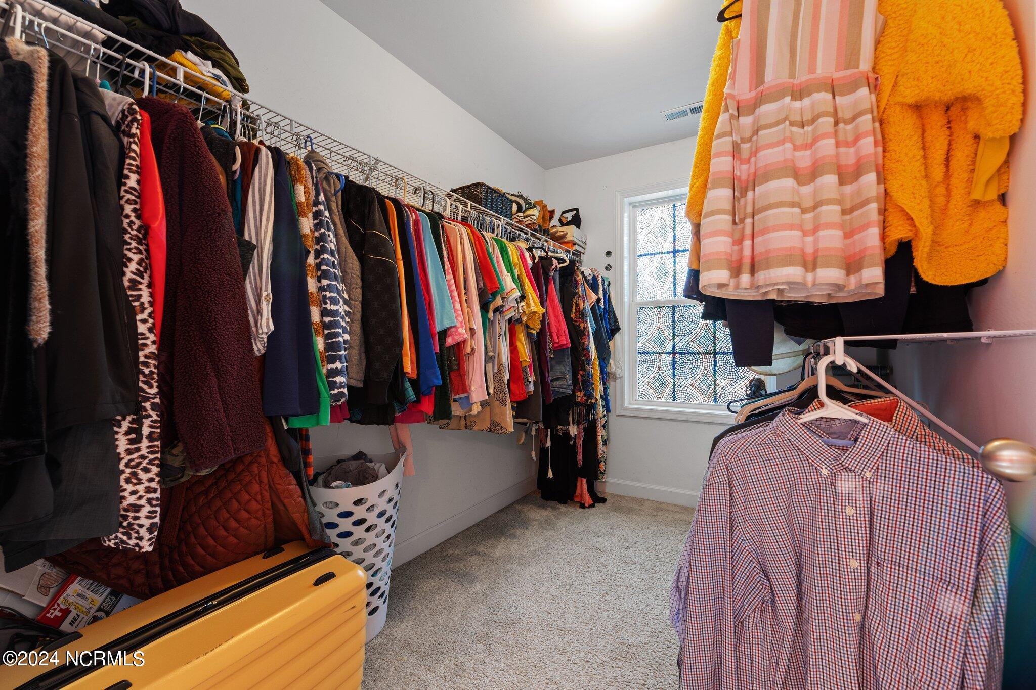 4055 Irwin Drive Aberdeen, NC 28315 - Photo 19 of 32 Primary Walk In Closet with Window Lighting