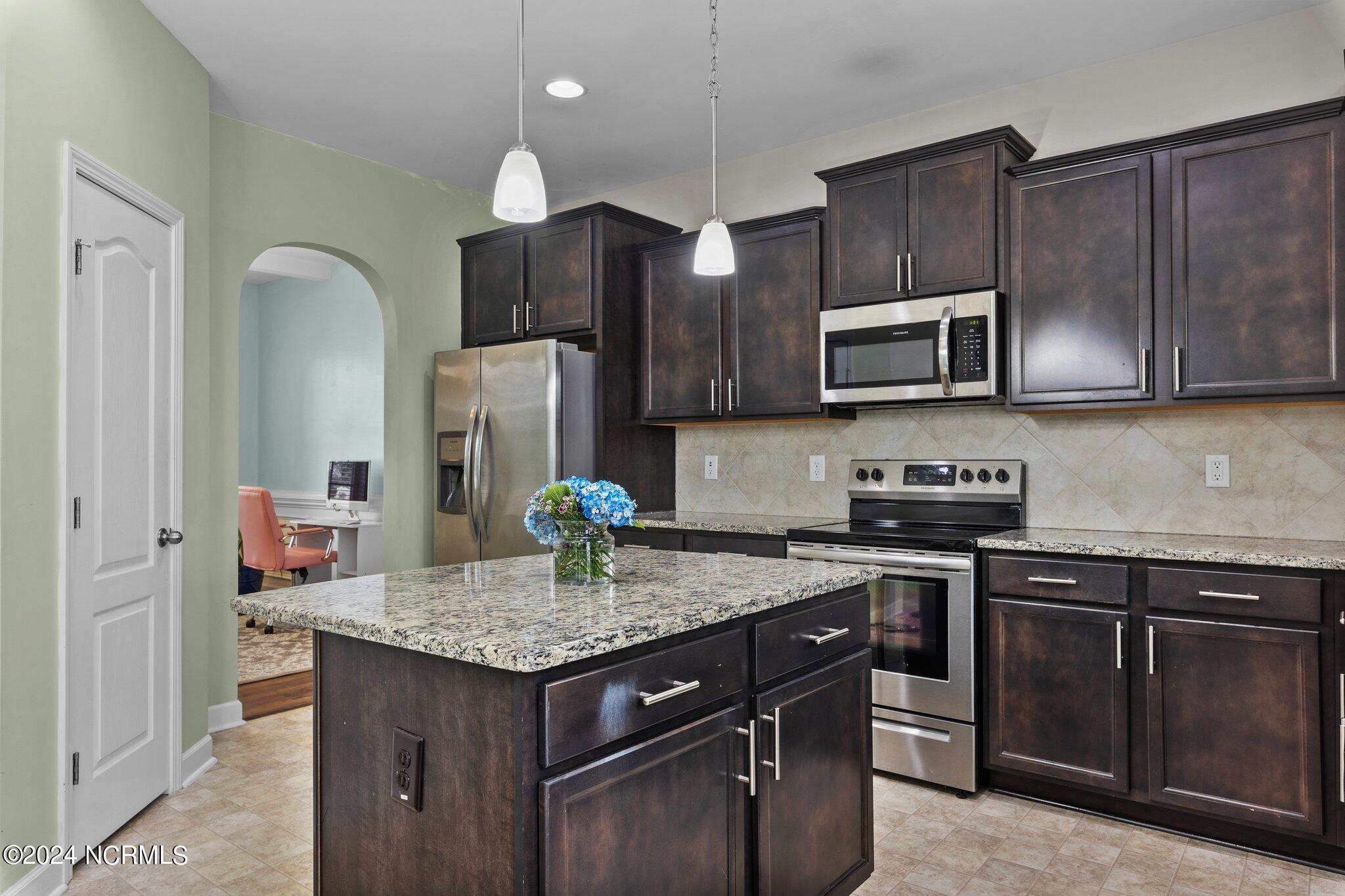 4055 Irwin Drive Aberdeen, NC 28315 - Photo 9 of 32 Kitchen - Storage on Island and Plenty of Cabinets