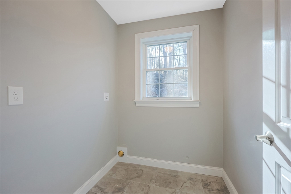 19 Oriole Drive Groton, MA 01450 - Photo 15 of 33 an empty room with a window