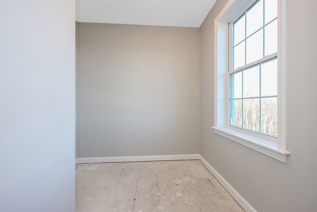 19 Oriole Drive Groton, MA 01450 - Photo 22 of 33 an empty room with a window