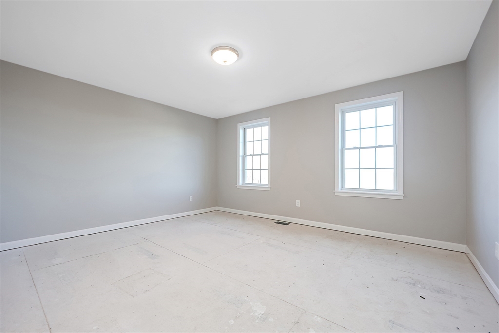 19 Oriole Drive Groton, MA 01450 - Photo 25 of 33 an empty room with windows