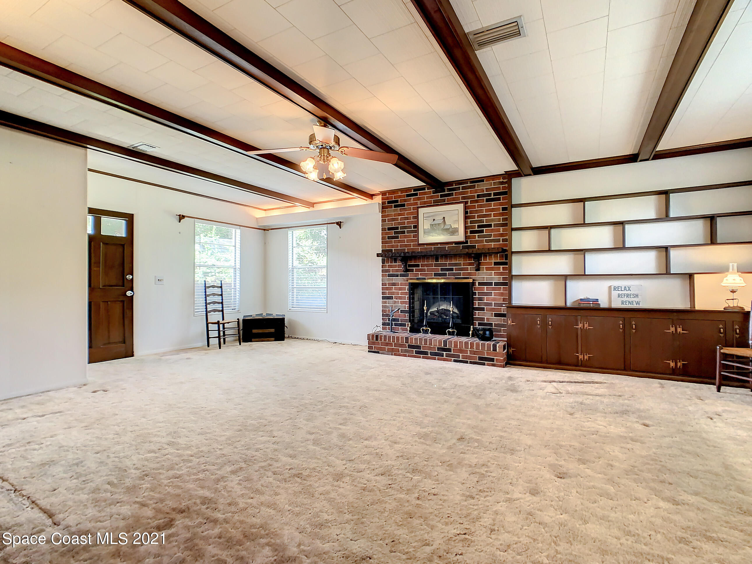 940 Forest Road Titusville, FL 32780 - Photo 14 of 33 Over-sized Family Room!