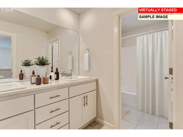 a bathroom with a sink a mirror and a shower