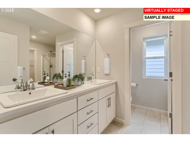 a bathroom with a sink a mirror and a vanity
