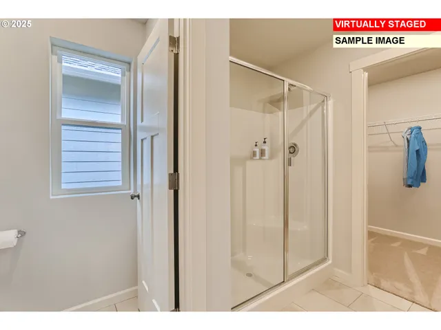 a view of a bathroom with a glass door