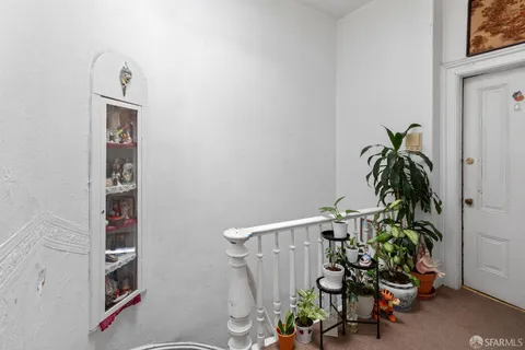 a vase of flowers sitting on a table in a room