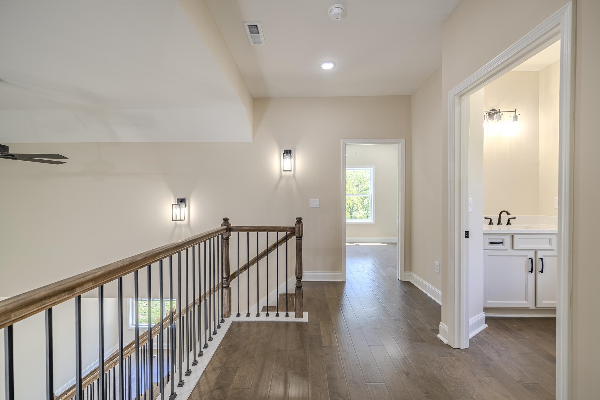 50 Fox Trot Road Adamsville, TN 38310 - Photo 18 of 40 a view of a hallway with wooden floor