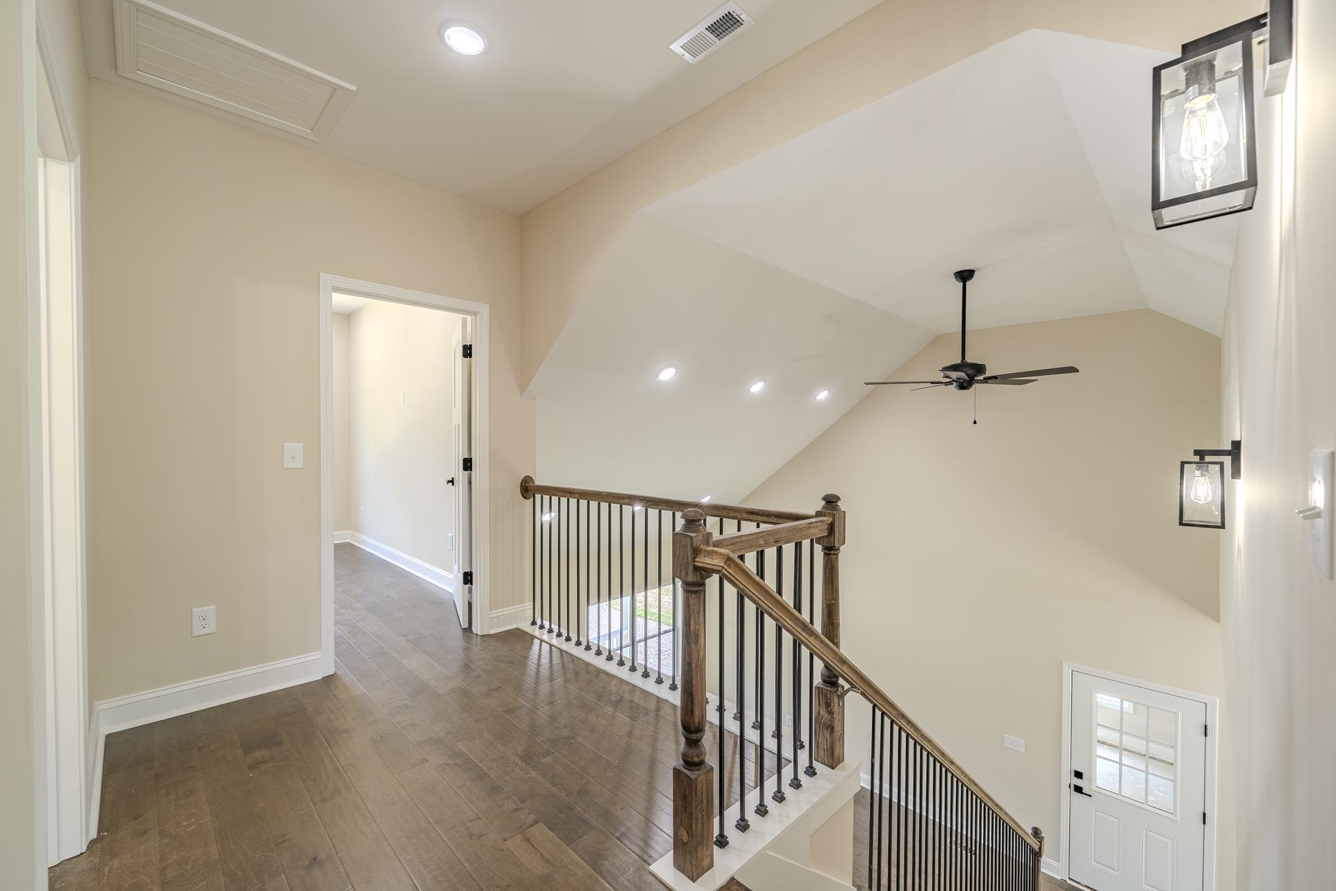 50 Fox Trot Road Adamsville, TN 38310 - Photo 19 of 40 a view of a hallway with wooden floor and staircase
