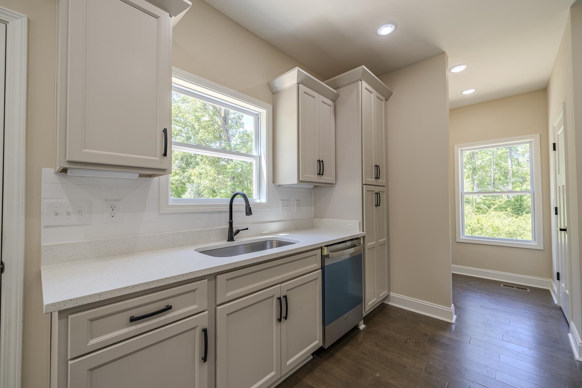 50 Fox Trot Road Adamsville, TN 38310 - Photo 2 of 40 a kitchen with a sink cabinets and window