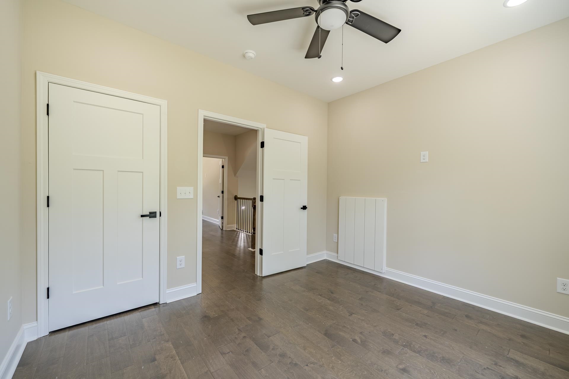 50 Fox Trot Road Adamsville, TN 38310 - Photo 26 of 40 a view of a livingroom with a ceiling fan & entryway