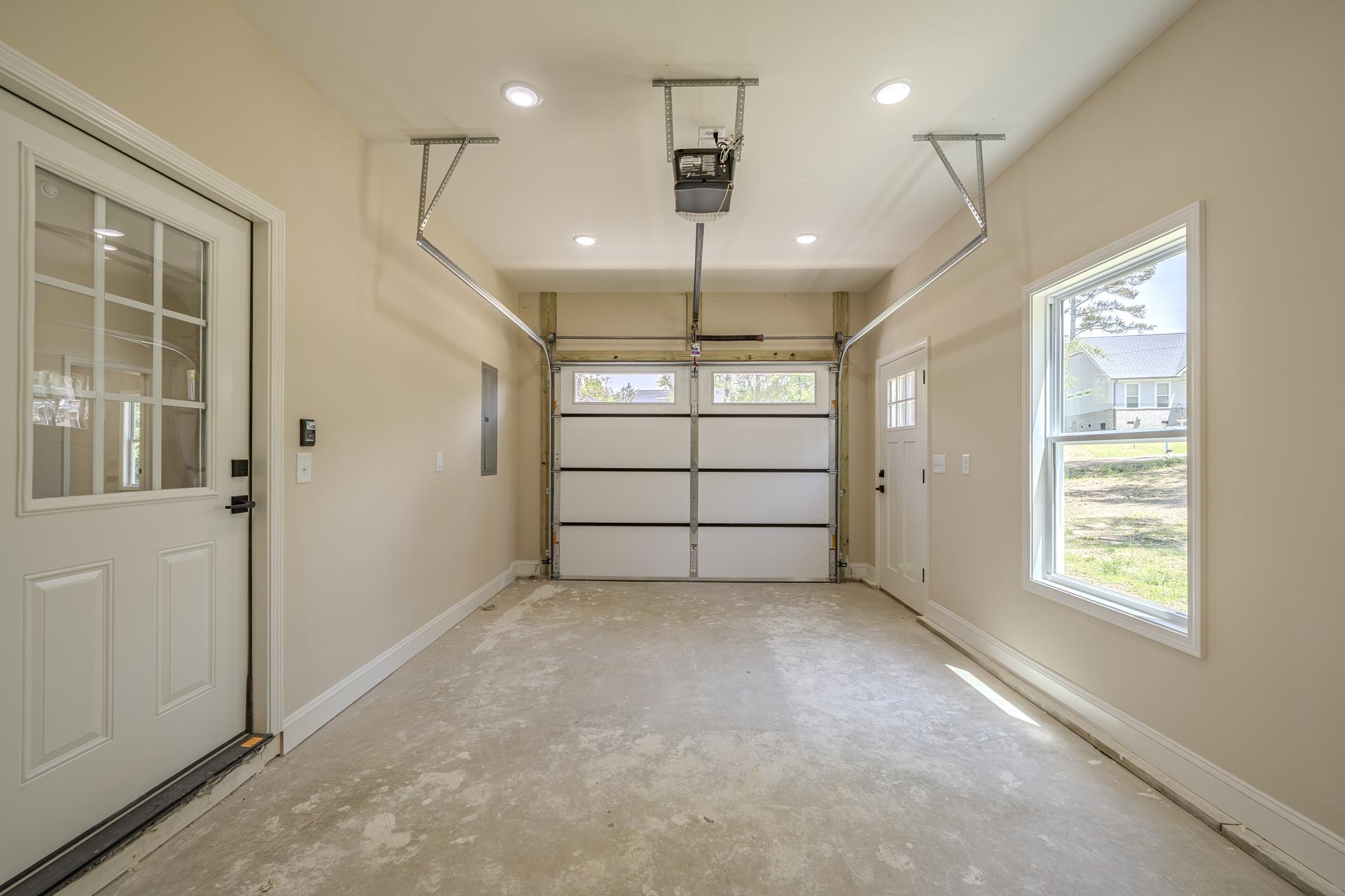 50 Fox Trot Road Adamsville, TN 38310 - Photo 30 of 40 an empty room with windows and ceiling fan