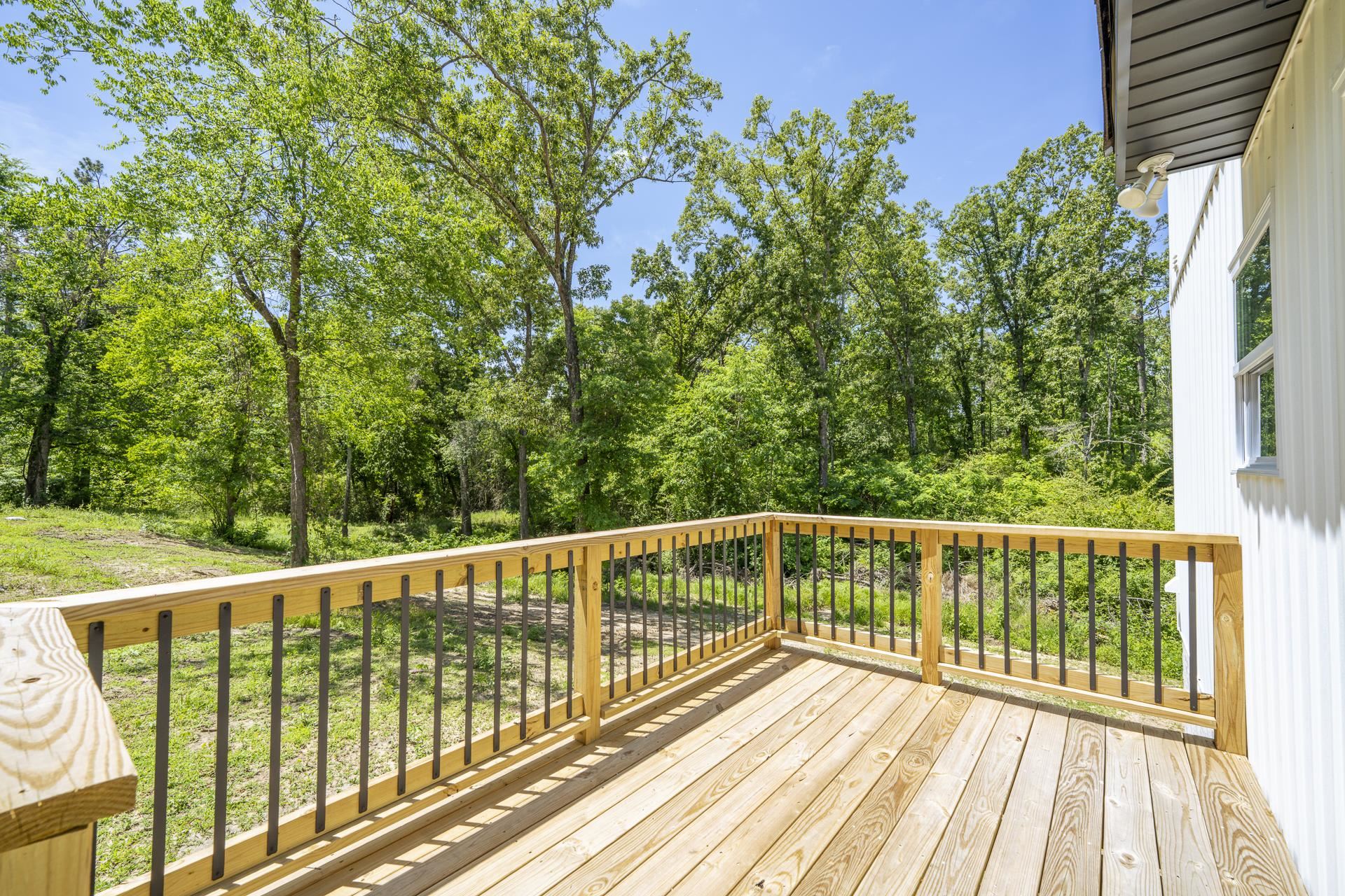 50 Fox Trot Road Adamsville, TN 38310 - Photo 36 of 40 a view of balcony with wooden floor