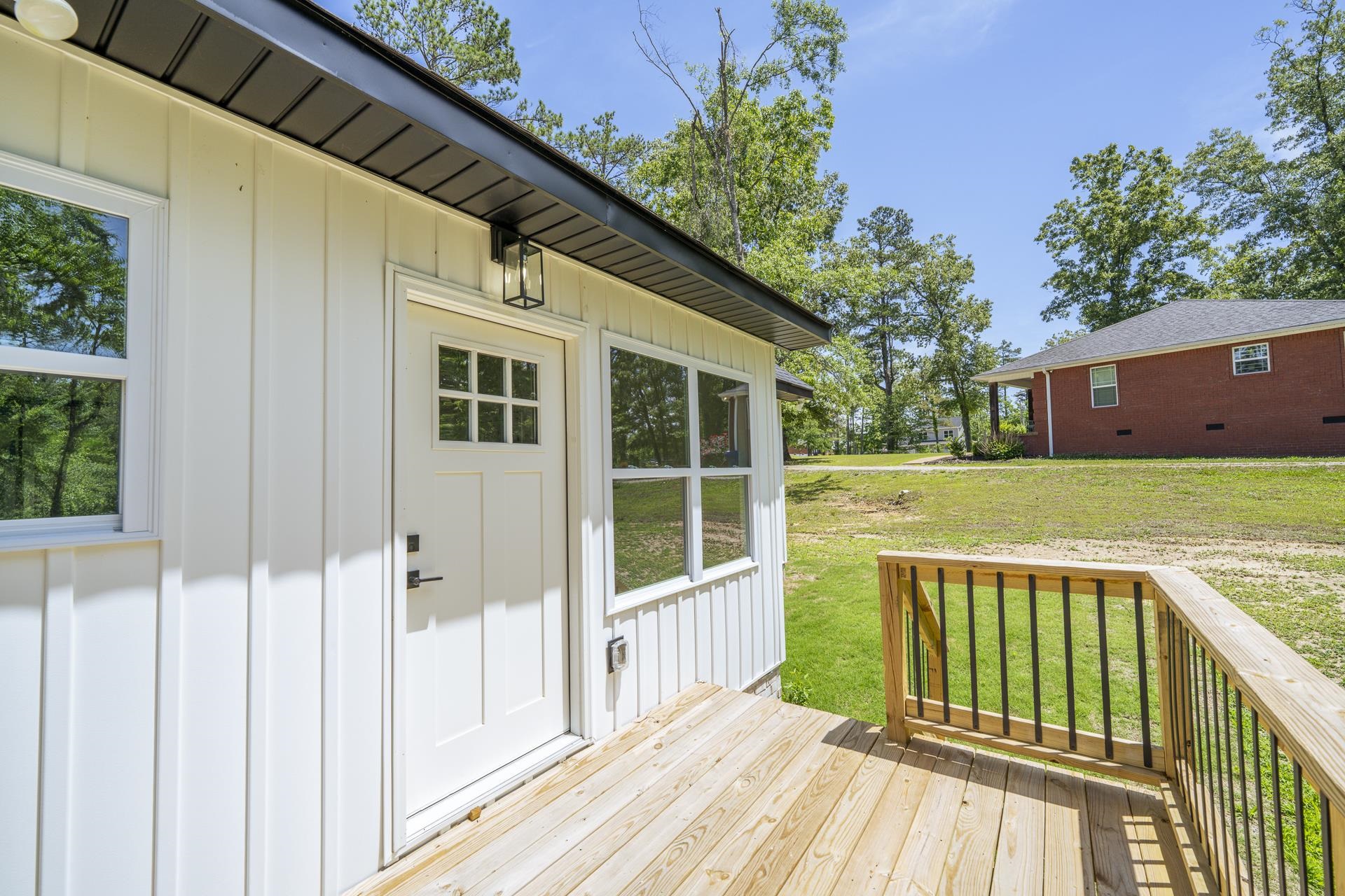 50 Fox Trot Road Adamsville, TN 38310 - Photo 37 of 40 a view of a balcony with wooden floor and fence