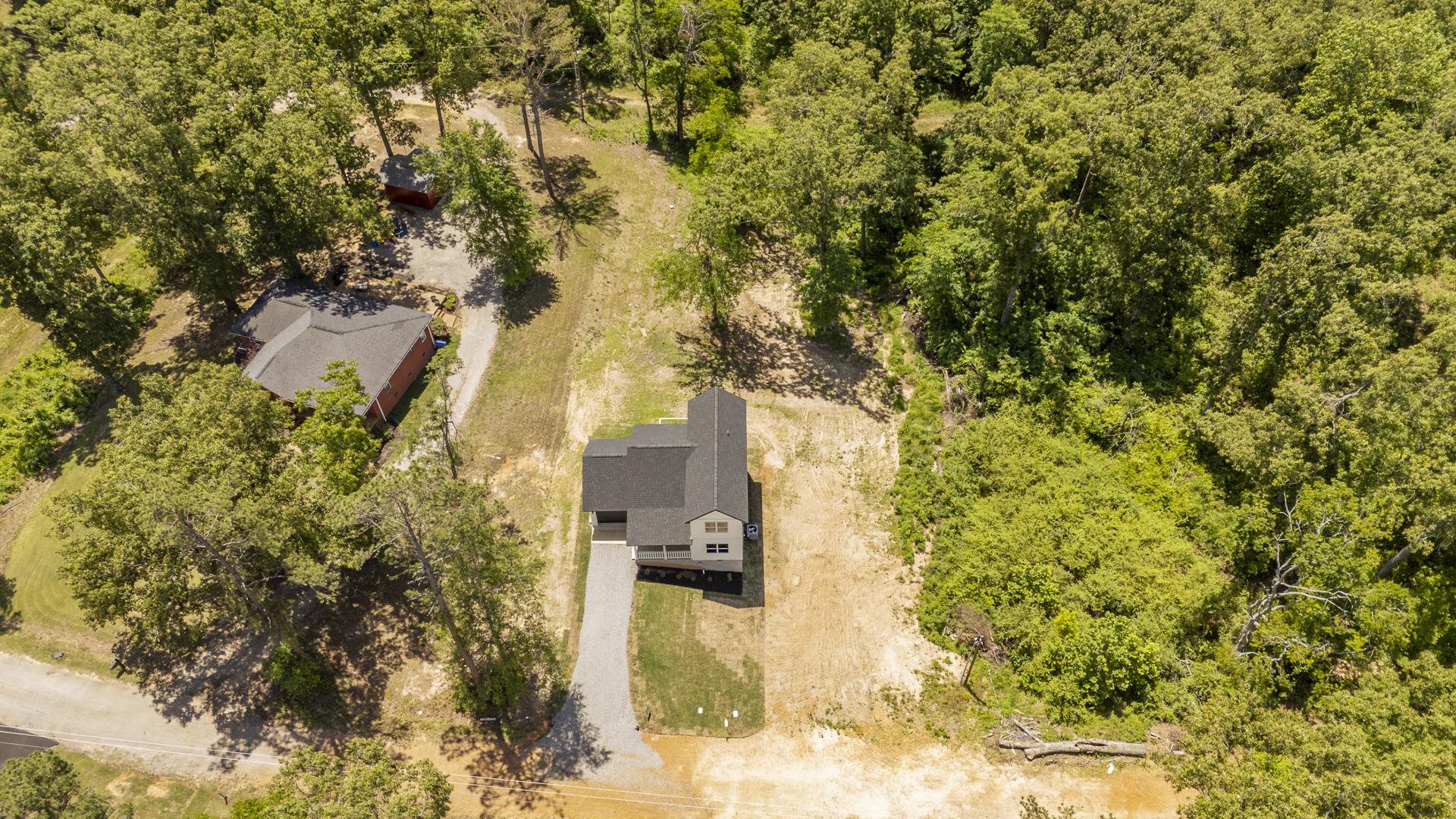 50 Fox Trot Road Adamsville, TN 38310 - Photo 39 of 40 view of a yard with trees