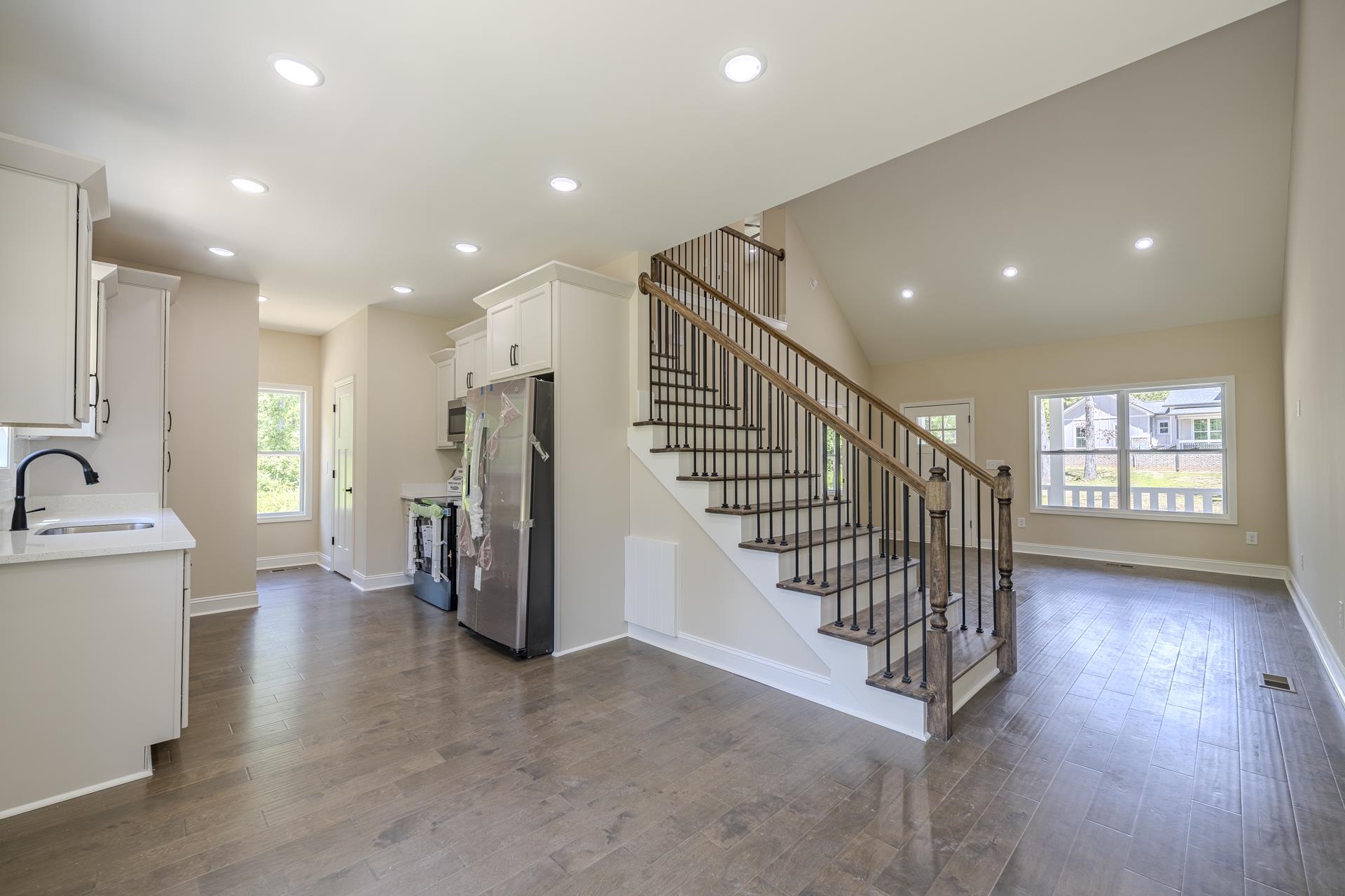 50 Fox Trot Road Adamsville, TN 38310 - Photo 7 of 40 a view of entryway with stairs and wooden floor