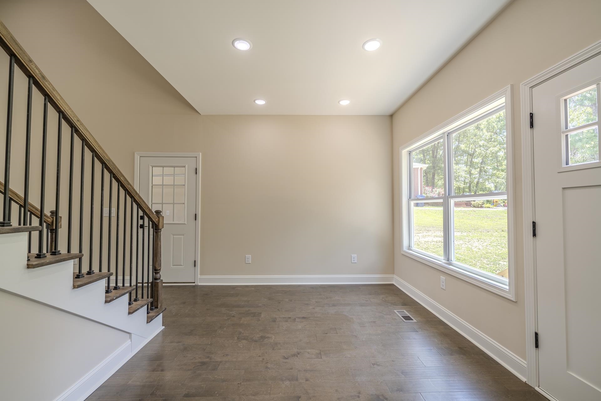 50 Fox Trot Road Adamsville, TN 38310 - Photo 8 of 40 a view of an entryway with wooden floor