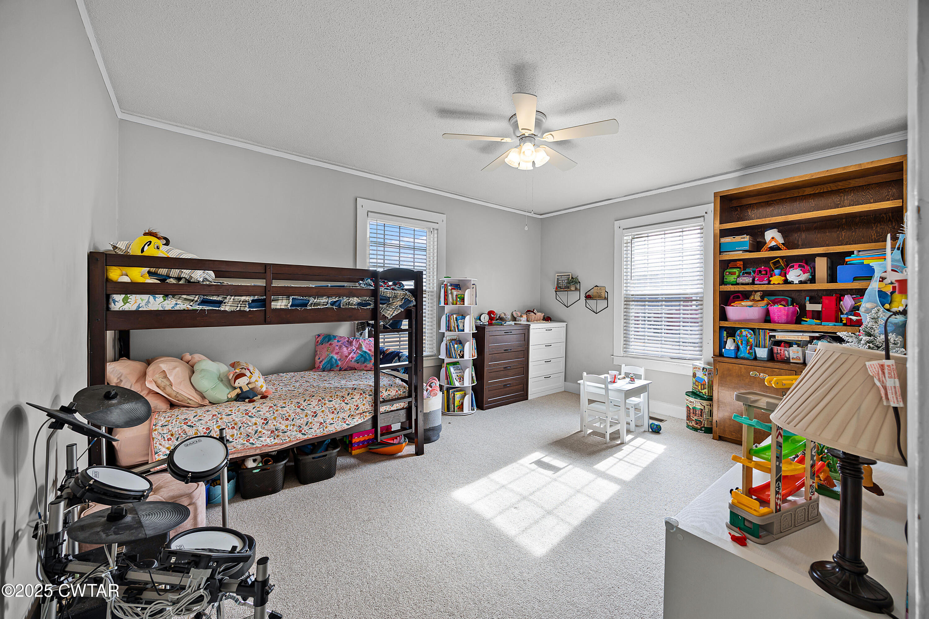 7 Herron Street Jackson, TN 38301 - Photo 17 of 19 a bedroom with bed and a window